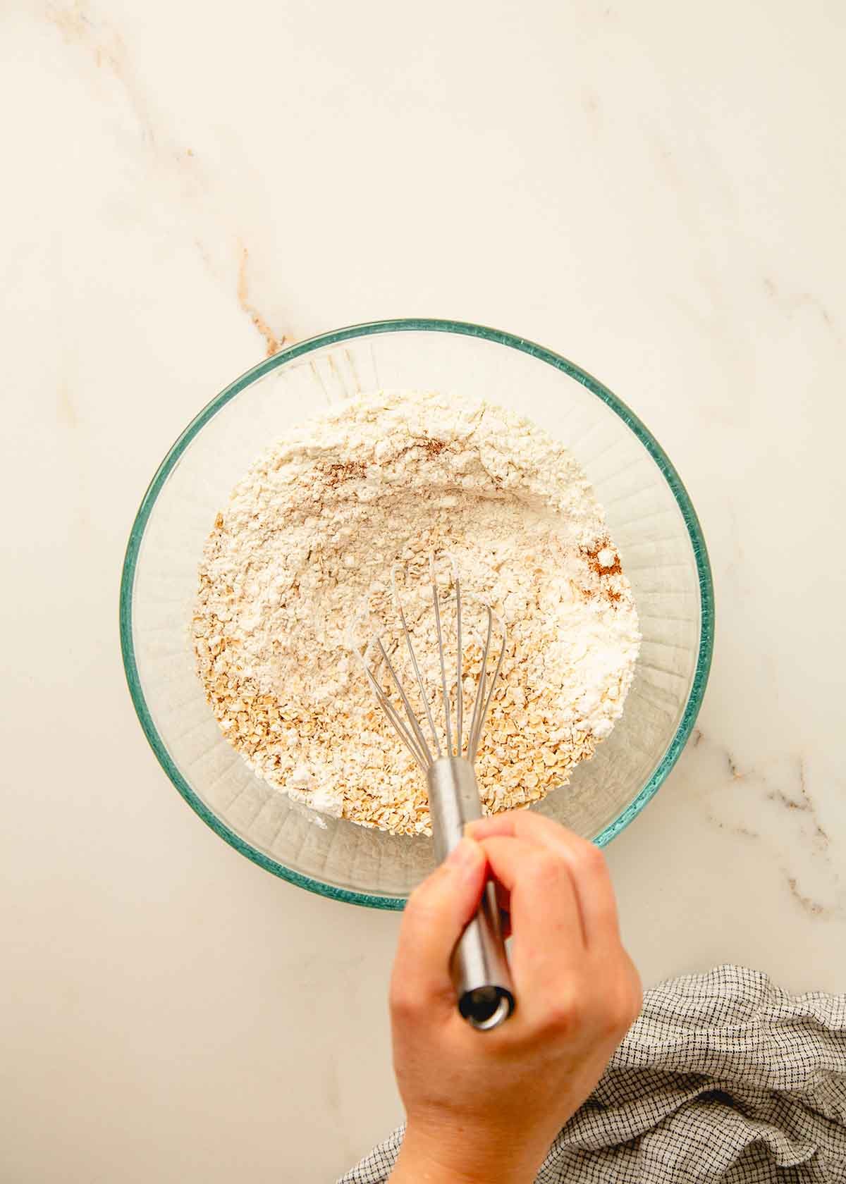Whisking Dry Ingredients in Large Clear Bowl