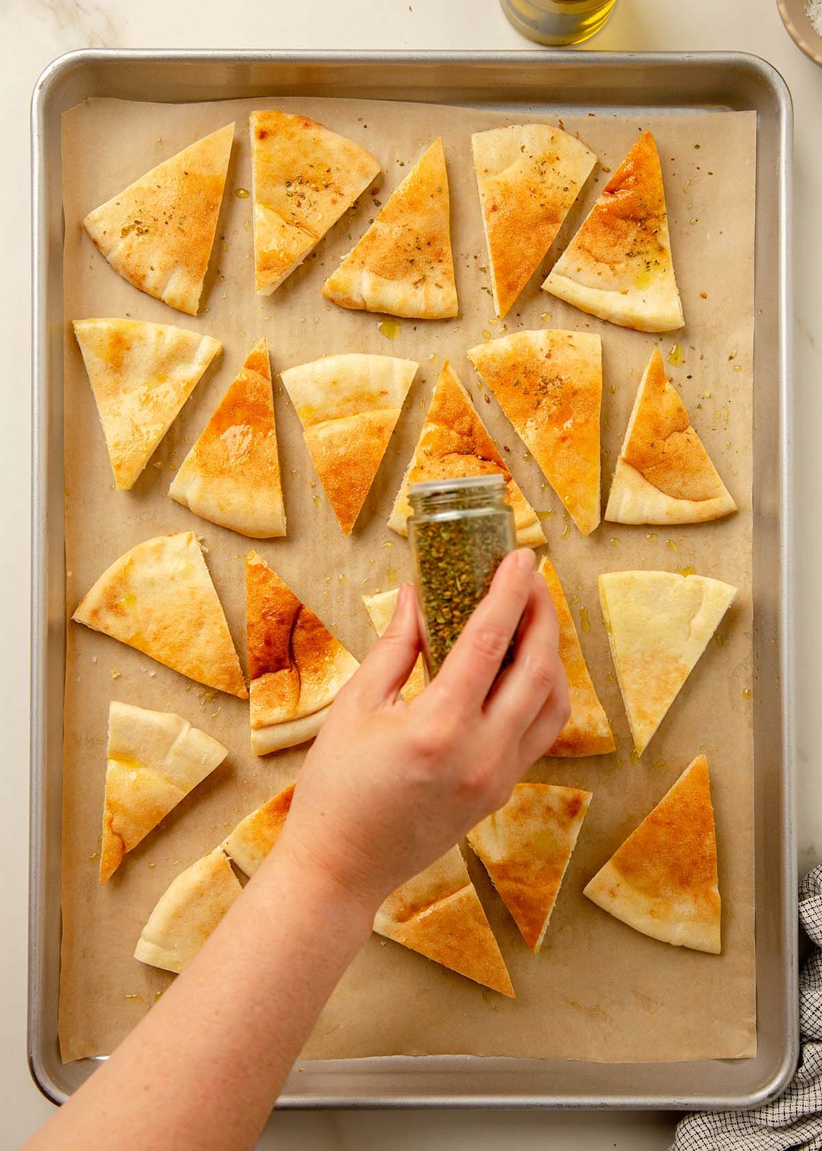 za'atar sprinkled onto pita chips