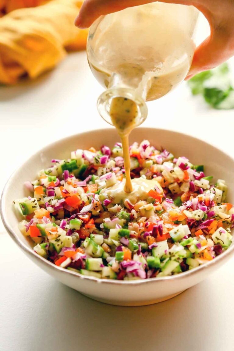 Vinaigrette Poured Over Salad