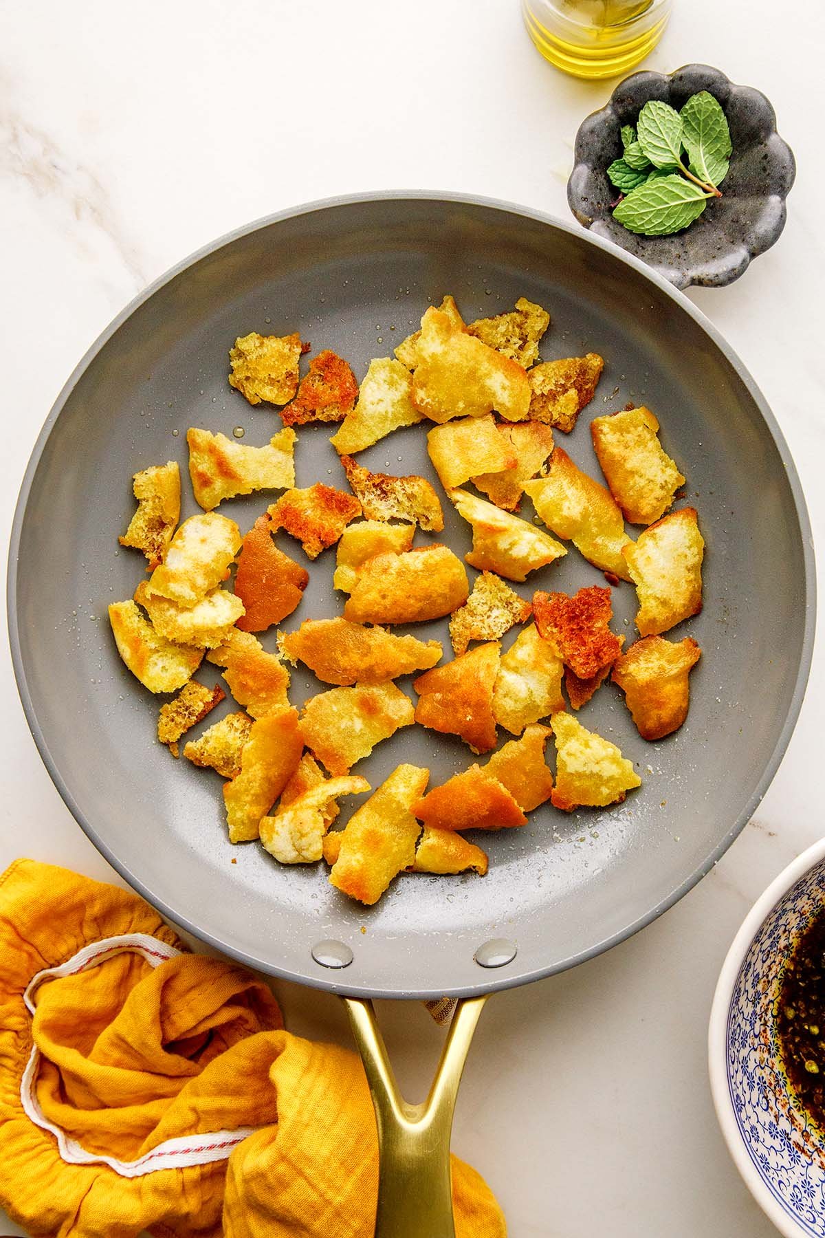 Pita Bread Frying in a Pan in Olive Oil