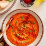 smoky red pepper and walnut muhammara topped with fresh mint