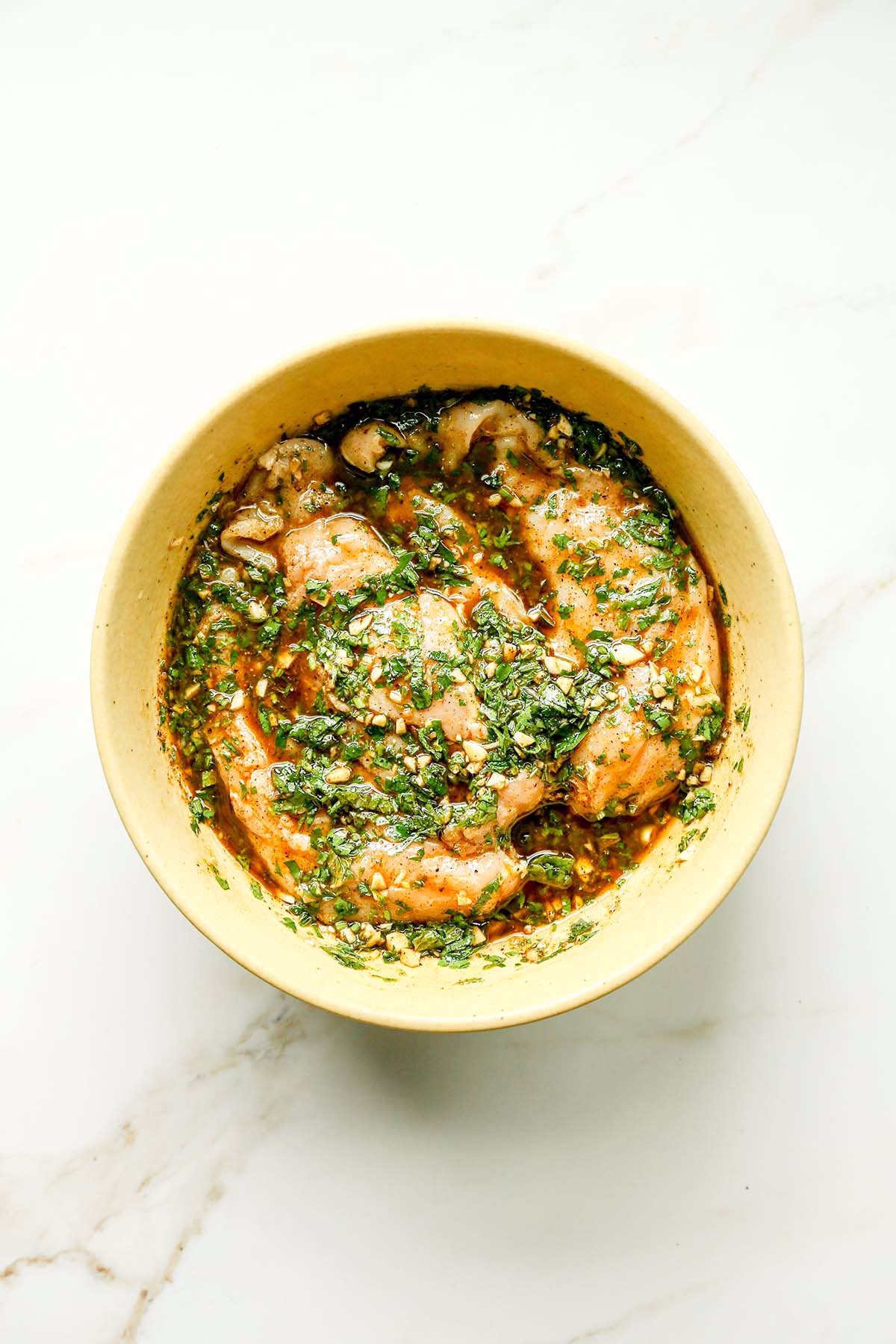 Chicken Breast Marinating in a Bowl