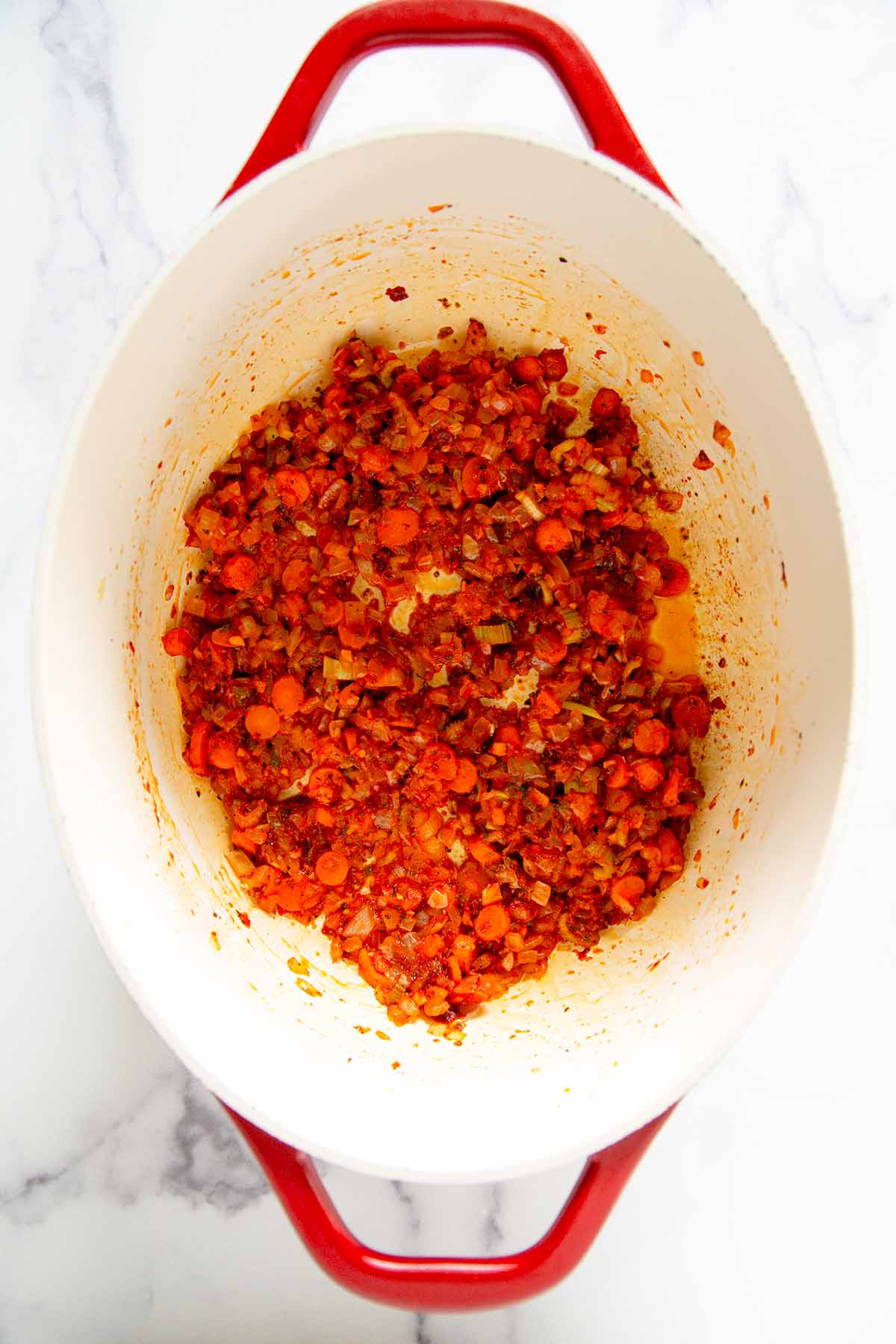 tomato and red pepper paste with onion, garlic celery, and onion