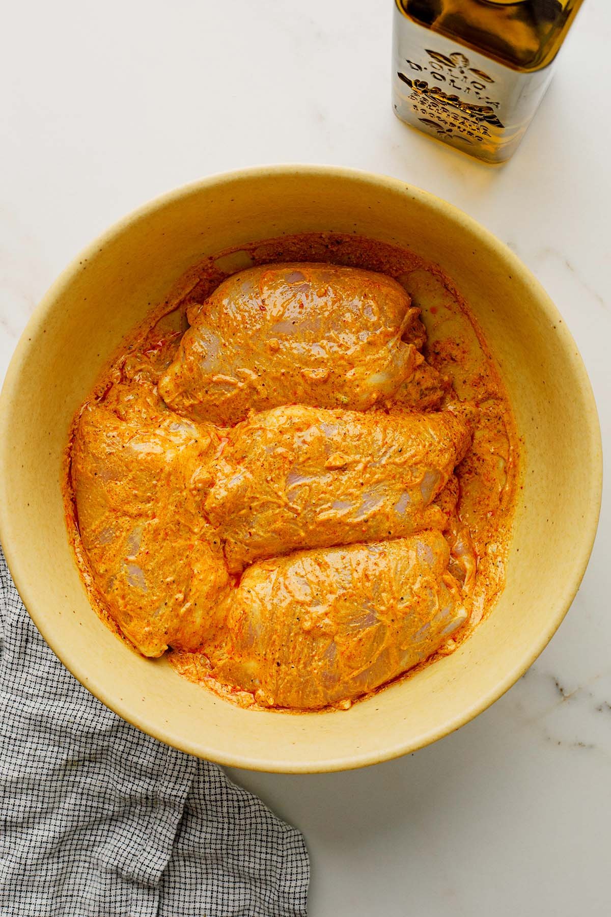 Chicken Thighs Marinating in Yogurt and Shawarma Spices