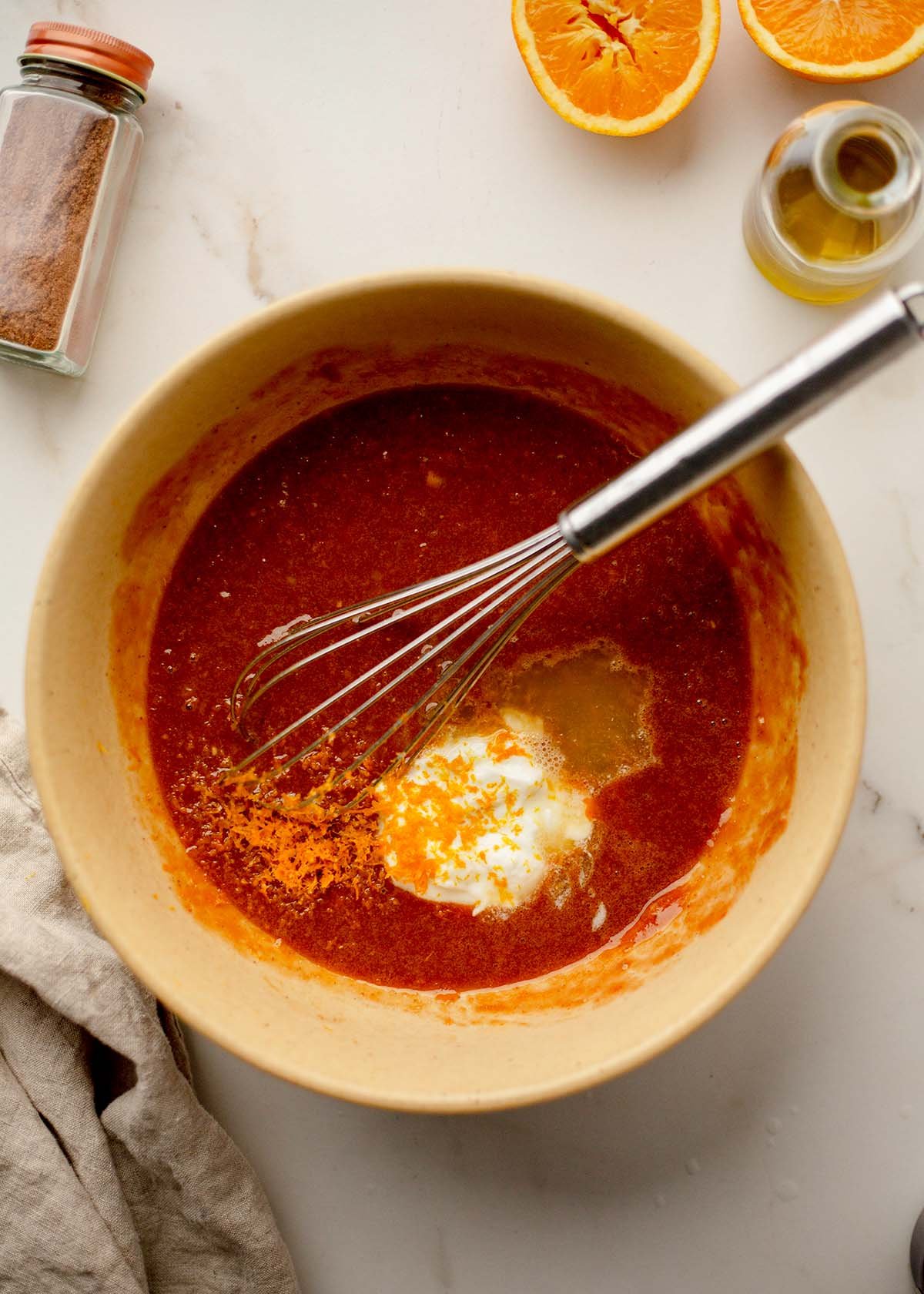 Yogurt and orange zest added to wet ingredients