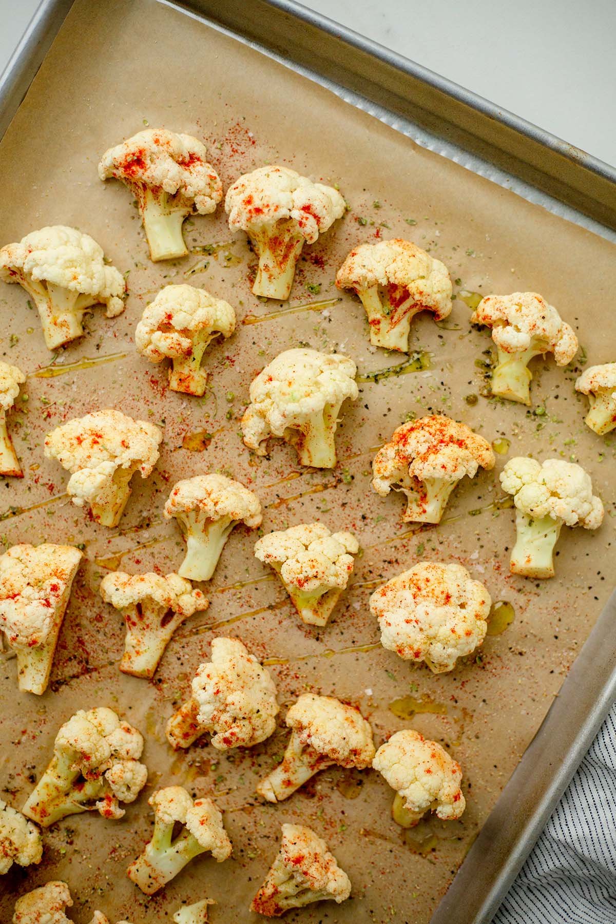 cauliflower florets on a sheet pan