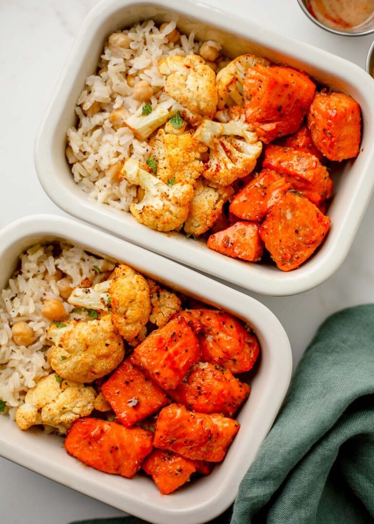 Meal prep containers of hot honey trout bites with cauliflower and rice.
