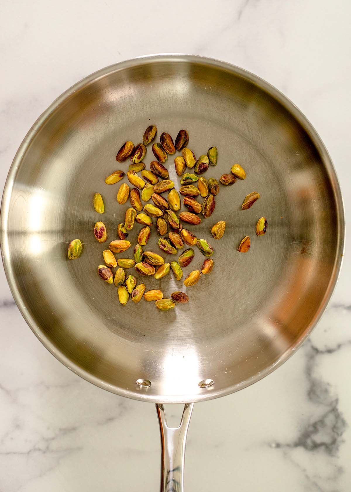 toasting pistachios in a skillet
