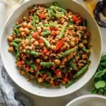 A vibrant Farro Salad with chickpeas, fresh green beans, and herbs