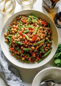 A vibrant Farro Salad with chickpeas, fresh green beans, and herbs