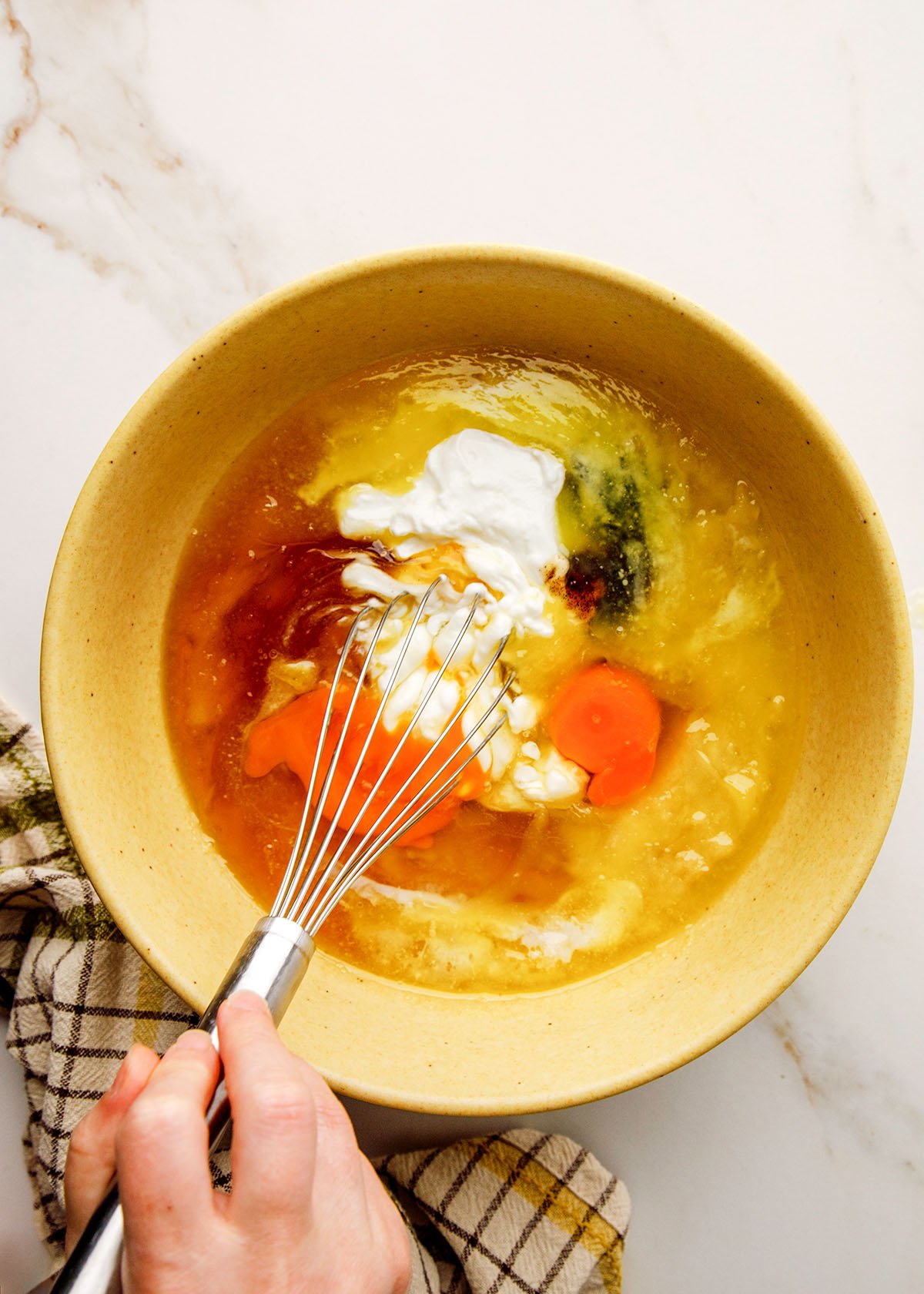 Greek Yogurt, Eggs, Honey, Butter, Mashed Banana, Vanilla in a Bowl